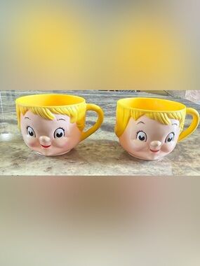Vintage 1970’s plastic soup mugs featuring the Campbell's Kids "Dolly Dingle"